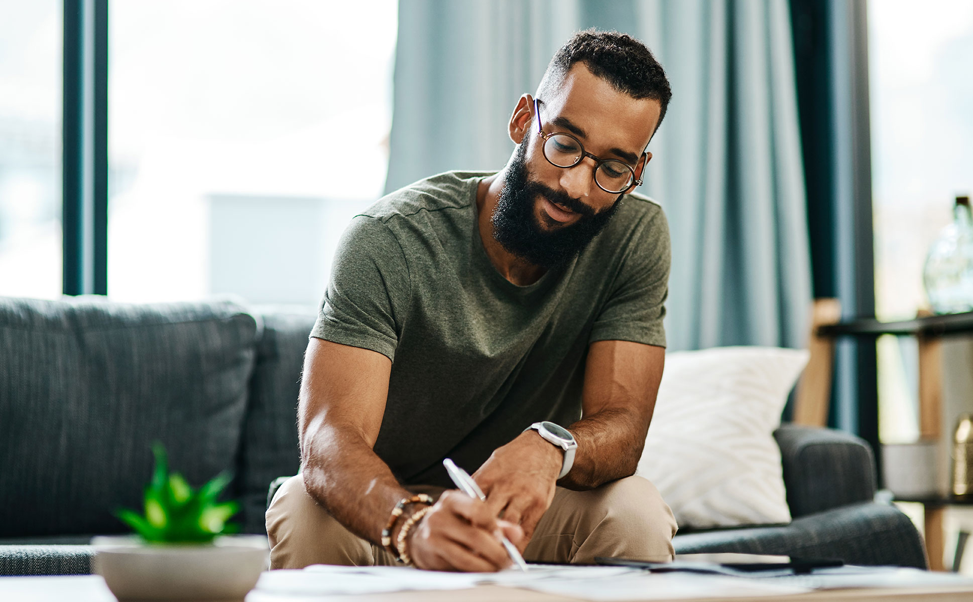 Young man filling out a survey